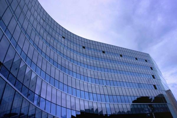 Fish Eye View Photo of Glass High Story Building over White Cloudy Sky during Daytime, IT Companies In Coimbatore