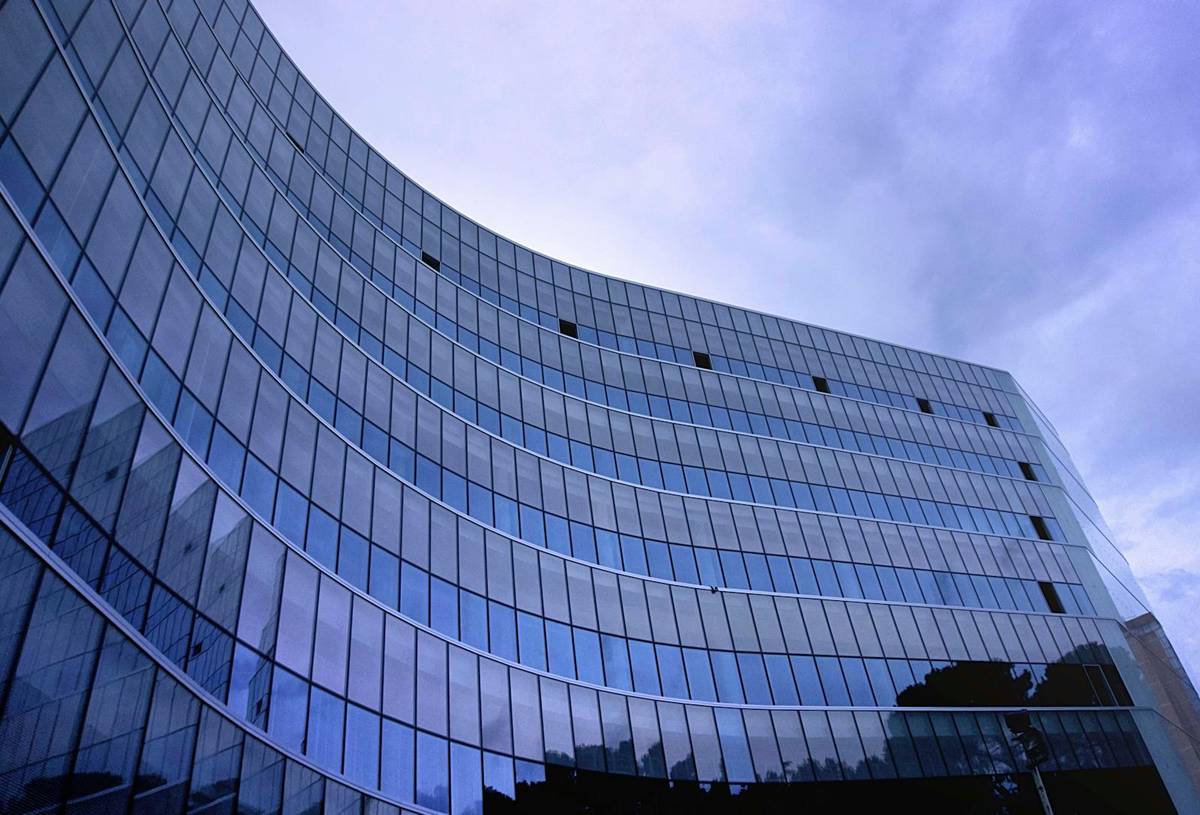Fish Eye View Photo of Glass High Story Building over White Cloudy Sky during Daytime, IT Companies In Coimbatore